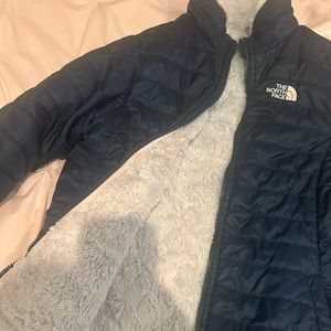 North face REVERSIBLE! 2 jackets in one. Navy shiny blue and soft fluffy teal!